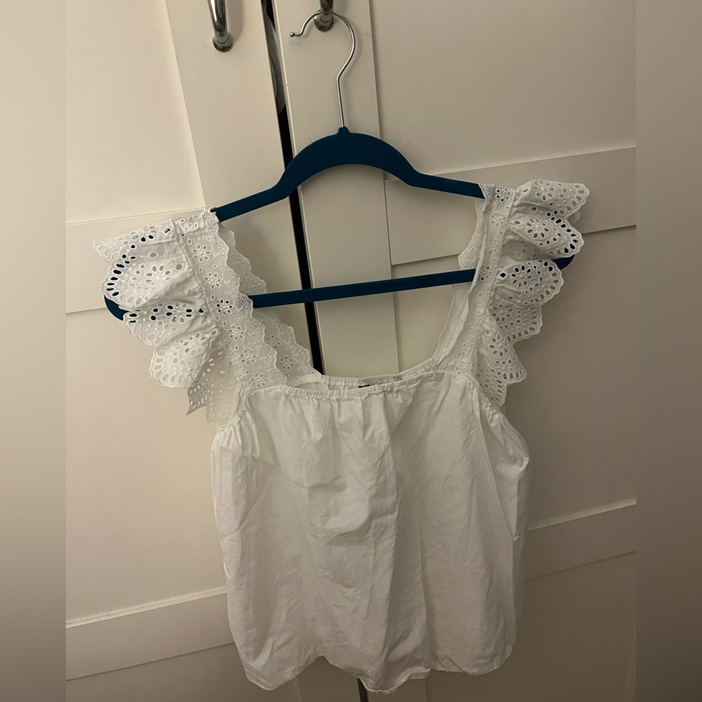 White Ruffled Sleeveless Blouse